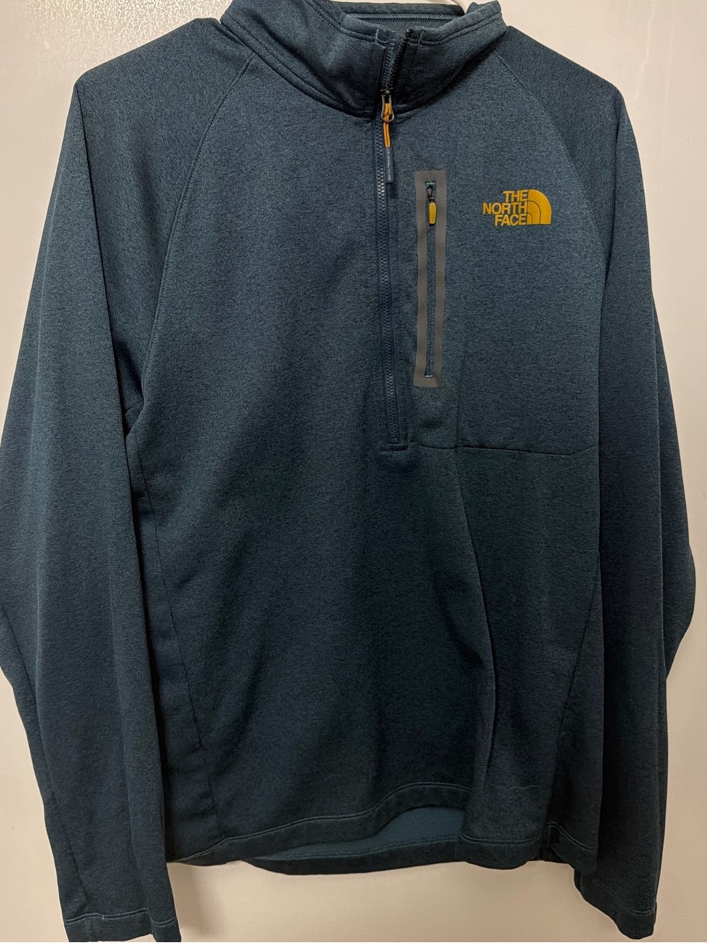 The North Face Men's Dark Teal Performance Quarter-Zip Jacket with Yellow Logo